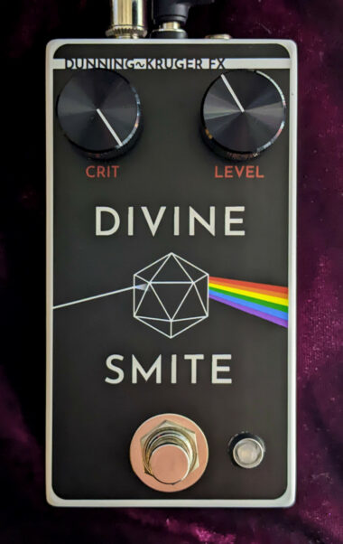 The Divine Smite pedal, decorated with a 20-sided die with white light coming in on one side scattered into a rainbow on the other, like the cover of Pink Floyd's Dark Side of the Moon