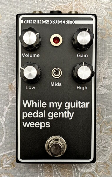 The While My Guitar Pedal Gently Weeps pedal, very plain looking with a lot of text