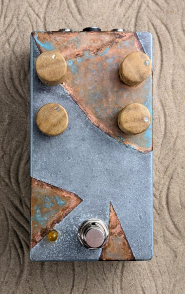 The Zenish pedal, which is mostly corroded aluminum with some corroded copper strips
